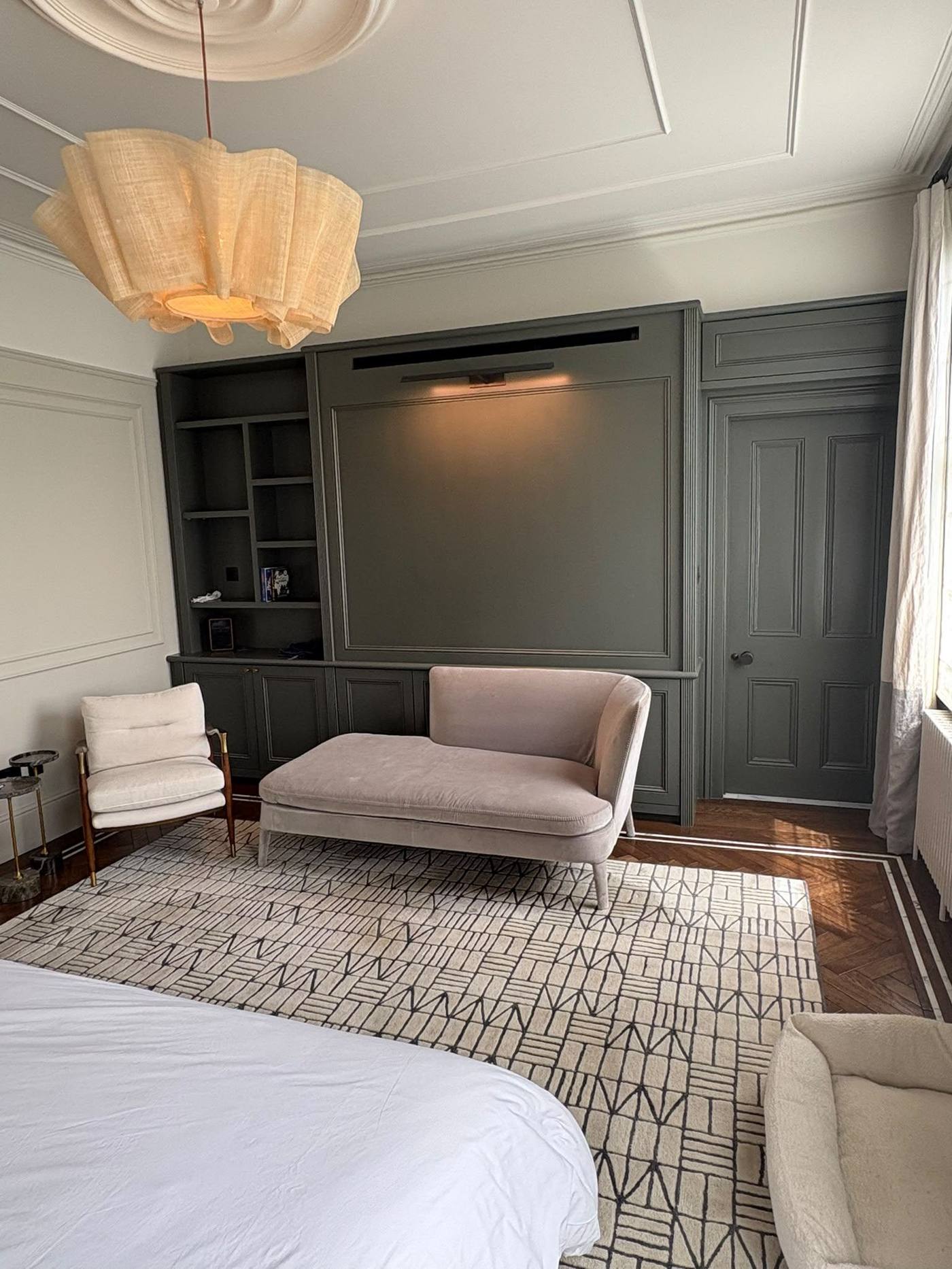 Sage green media wall bedroom, Edgware